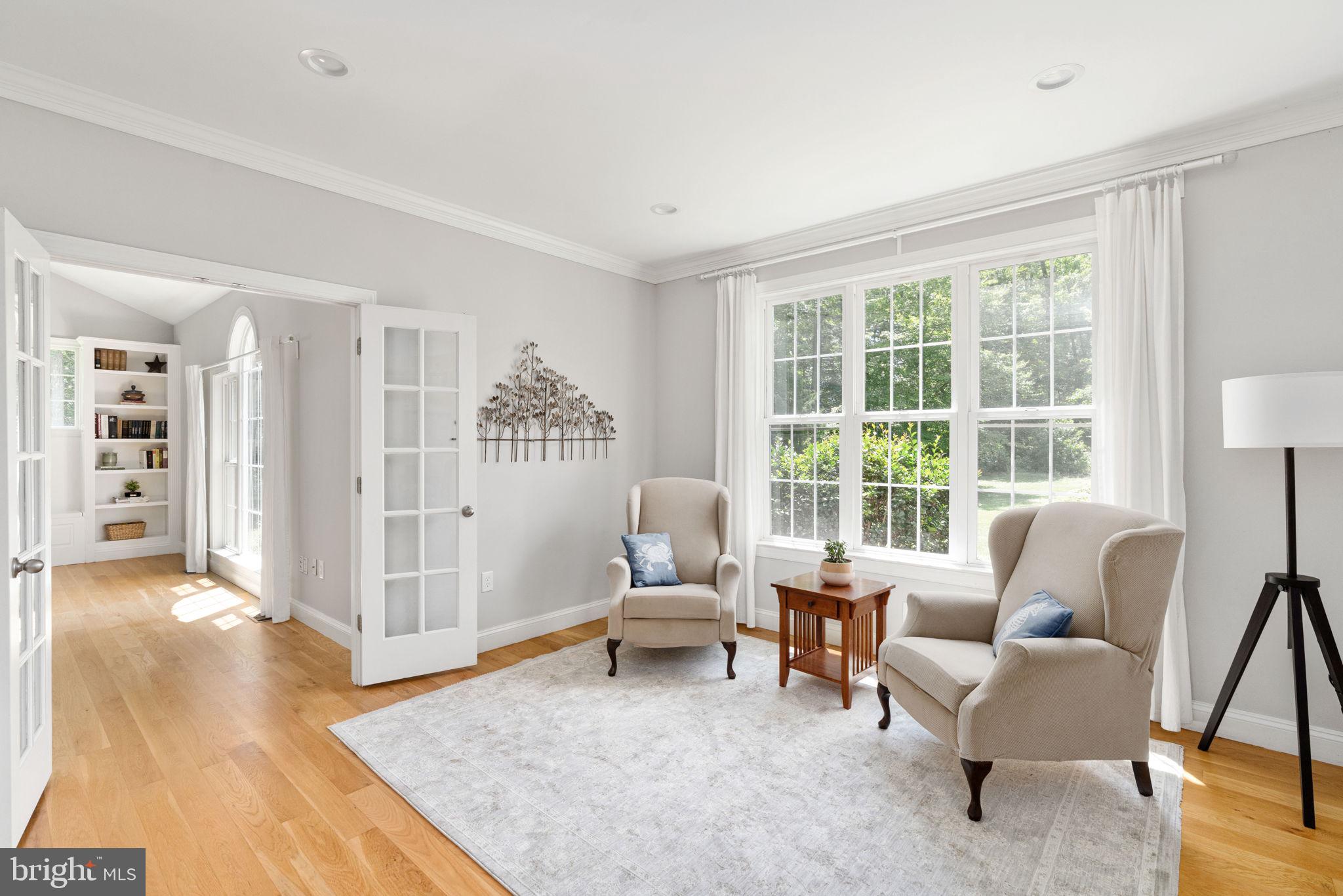 182 Wood Landing Road Fredericksburg, VA 22405 - Photo 23 of 102 a living room with furniture and a large window