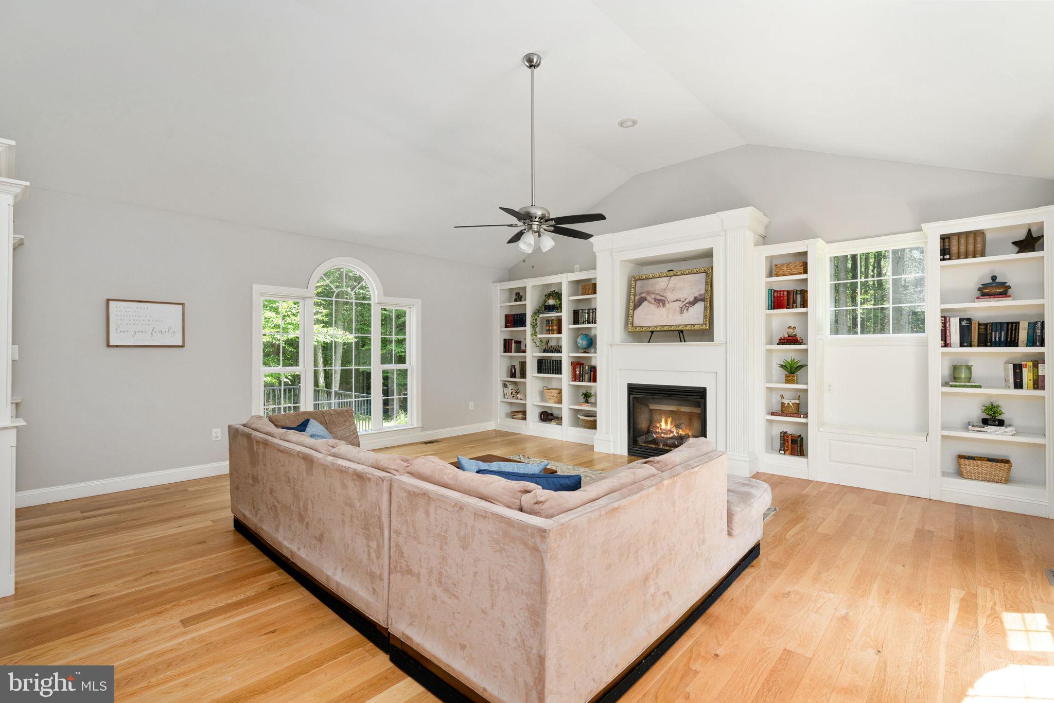 182 Wood Landing Road Fredericksburg, VA 22405 - Photo 25 of 102 a living room with furniture and a fireplace