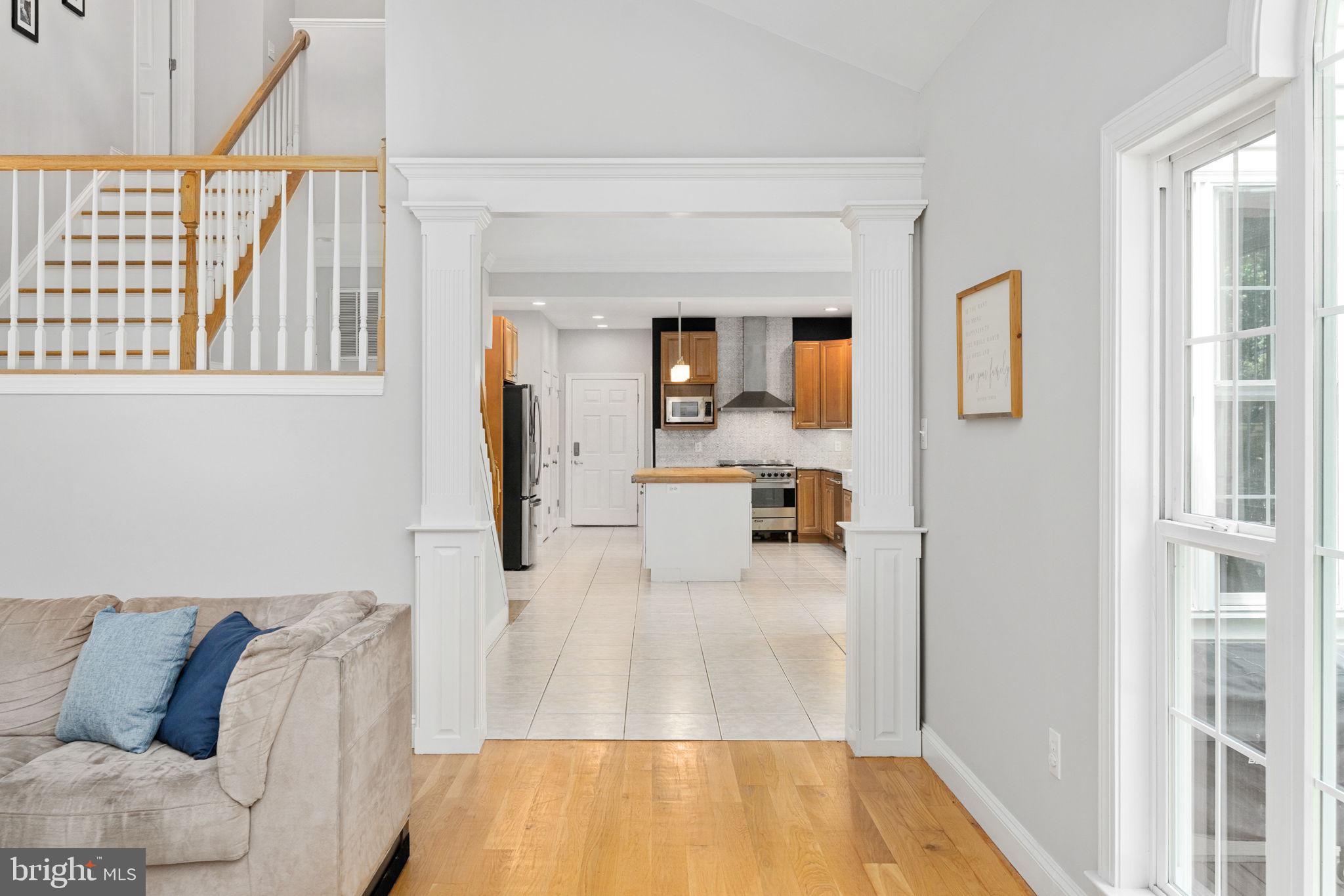 182 Wood Landing Road Fredericksburg, VA 22405 - Photo 29 of 102 a living room with furniture and a wooden floor