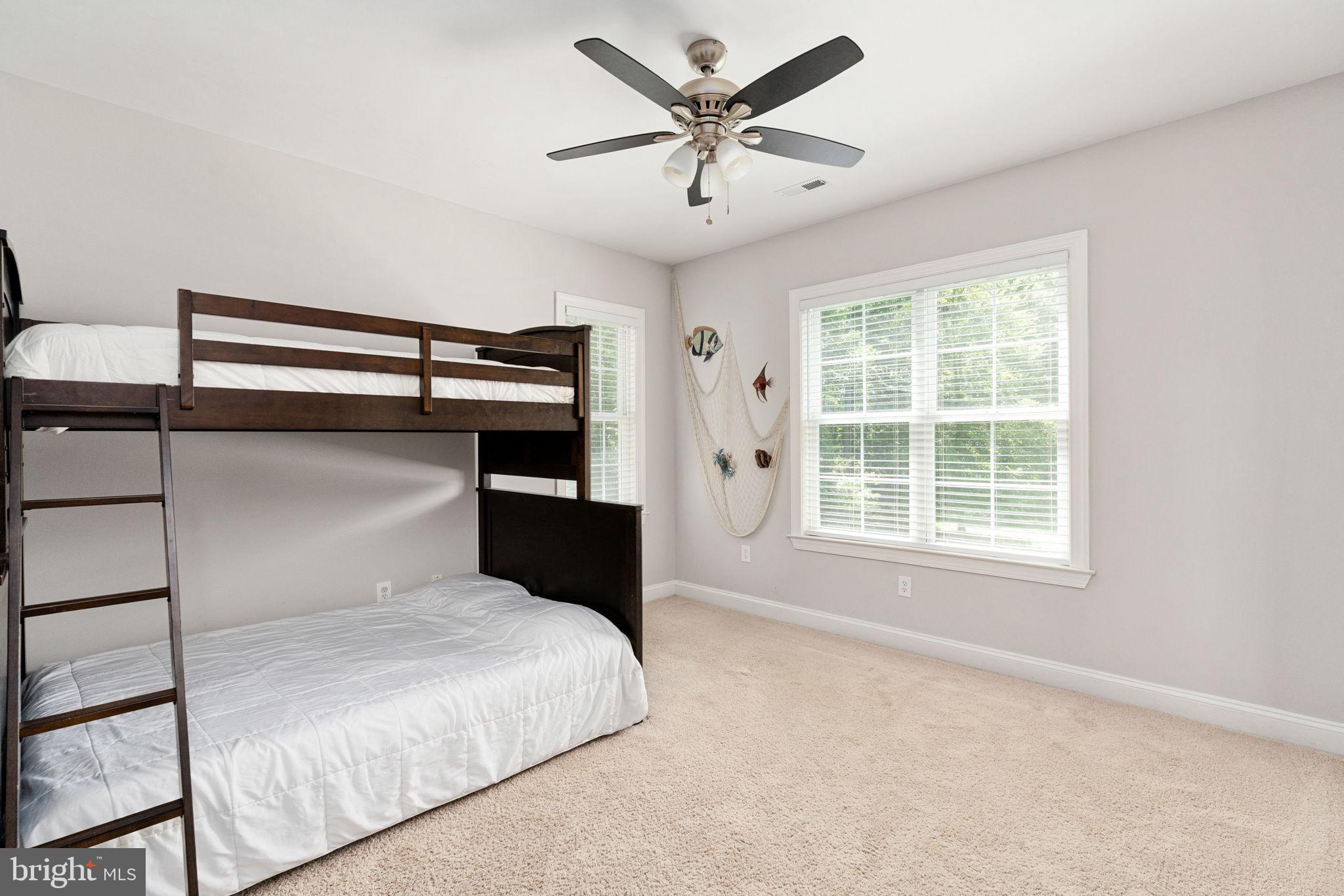 182 Wood Landing Road Fredericksburg, VA 22405 - Photo 48 of 102 a bedroom with a bed and window
