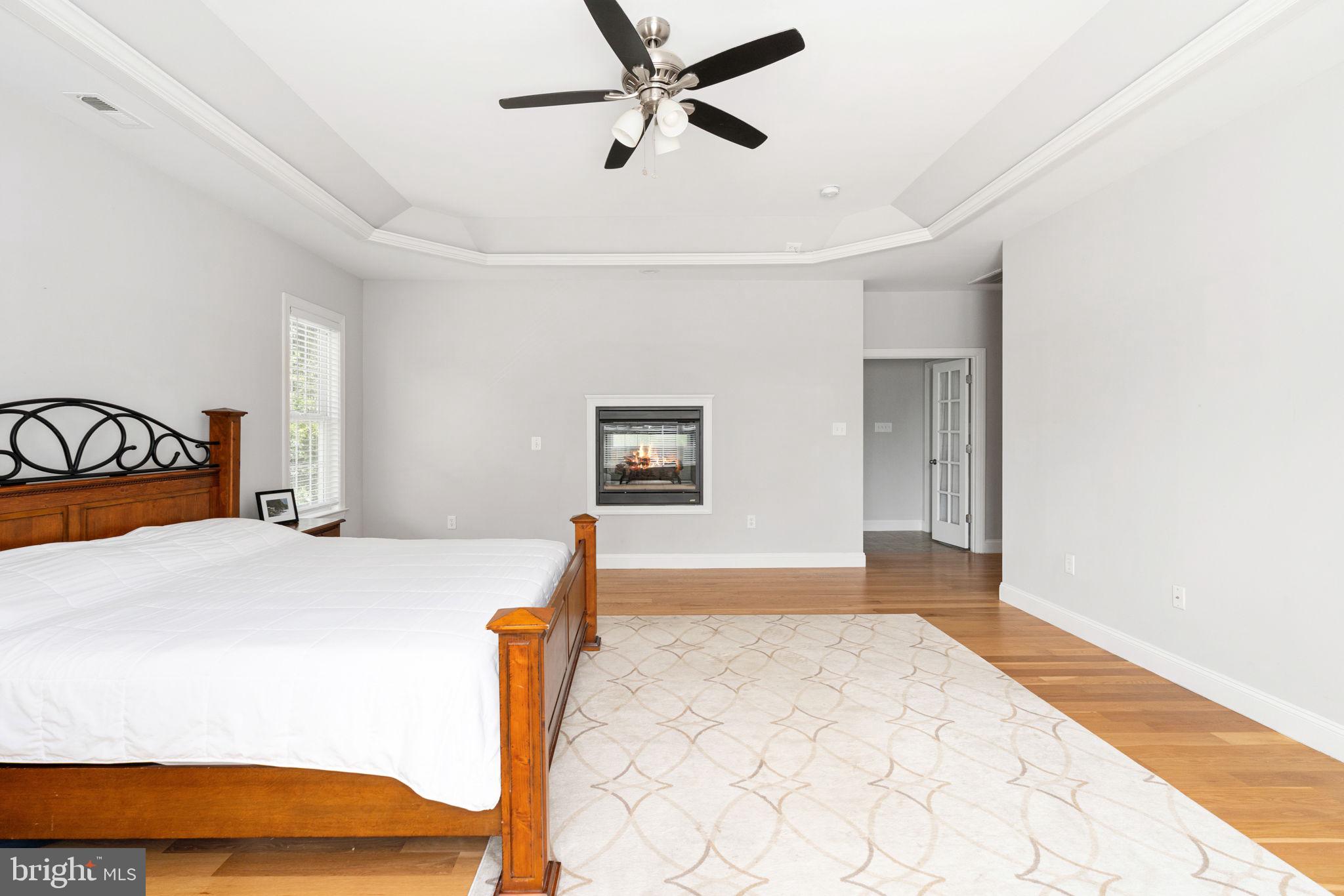 182 Wood Landing Road Fredericksburg, VA 22405 - Photo 62 of 102 a bedroom with a bed and a dresser