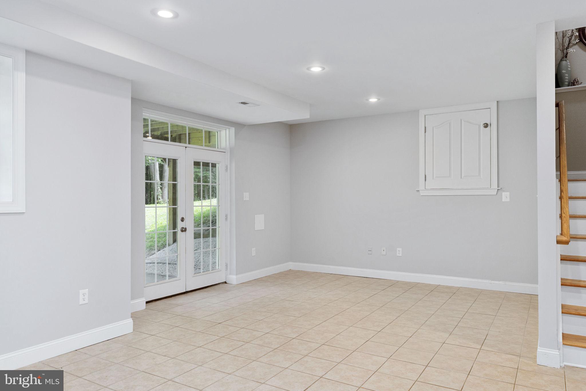182 Wood Landing Road Fredericksburg, VA 22405 - Photo 75 of 102 a view of an empty room with glass door