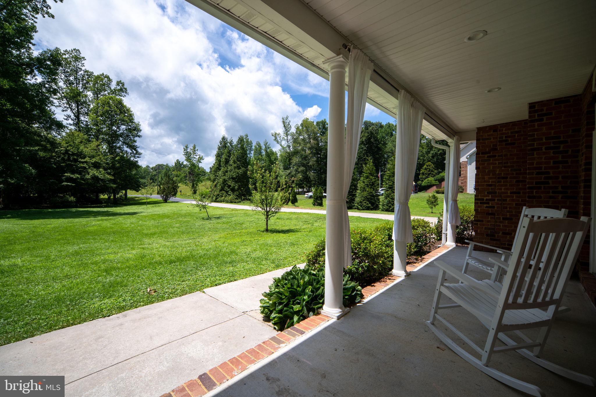 182 Wood Landing Road Fredericksburg, VA 22405 - Photo 83 of 102 a view of a porch with furniture and garden
