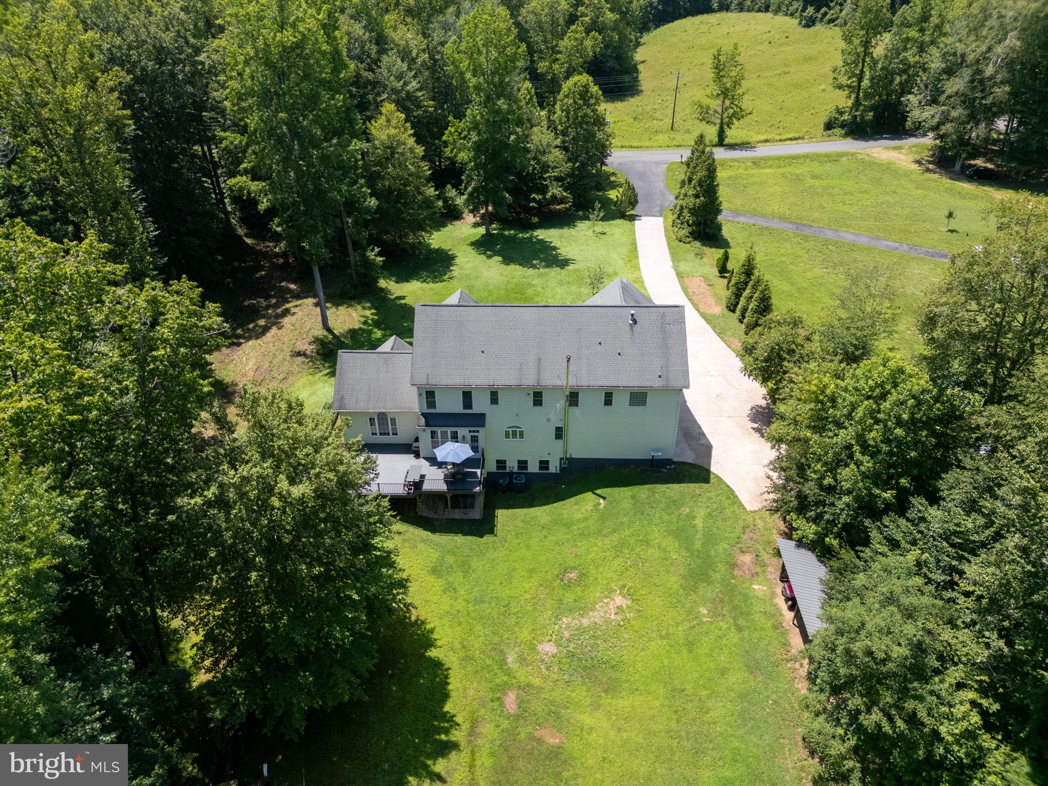 182 Wood Landing Road Fredericksburg, VA 22405 - Photo 93 of 102 an aerial view of a house with yard swimming pool and outdoor seating