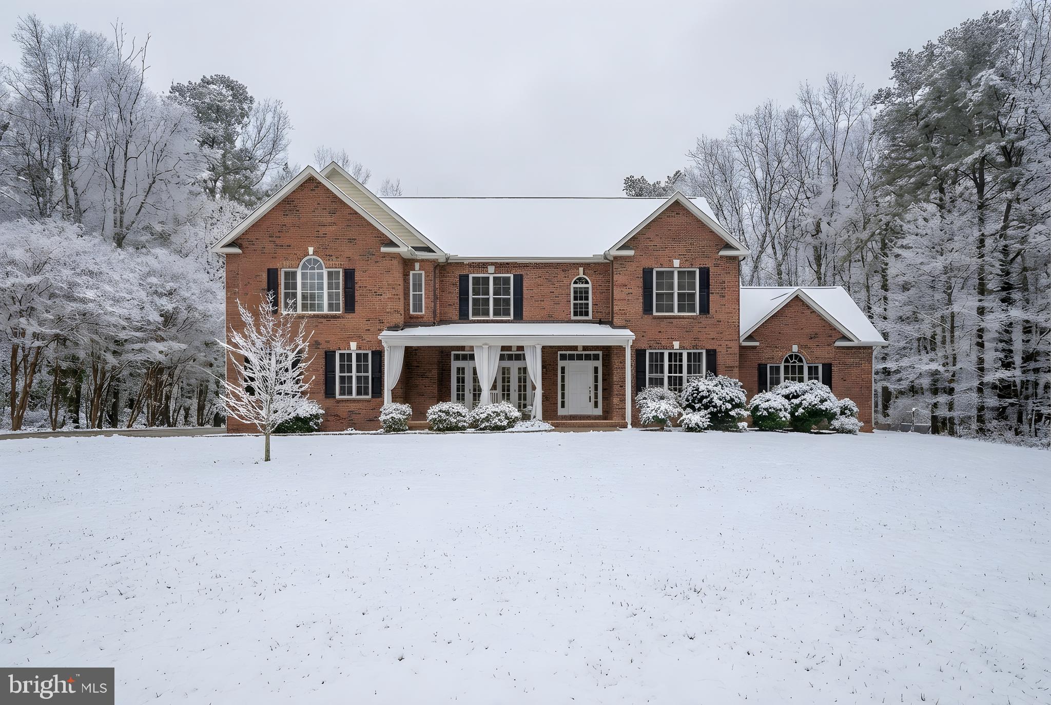 182 Wood Landing Road Fredericksburg, VA 22405 - Photo 99 of 102 a front view of a house with a yard