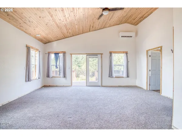 a big room with windows and closet