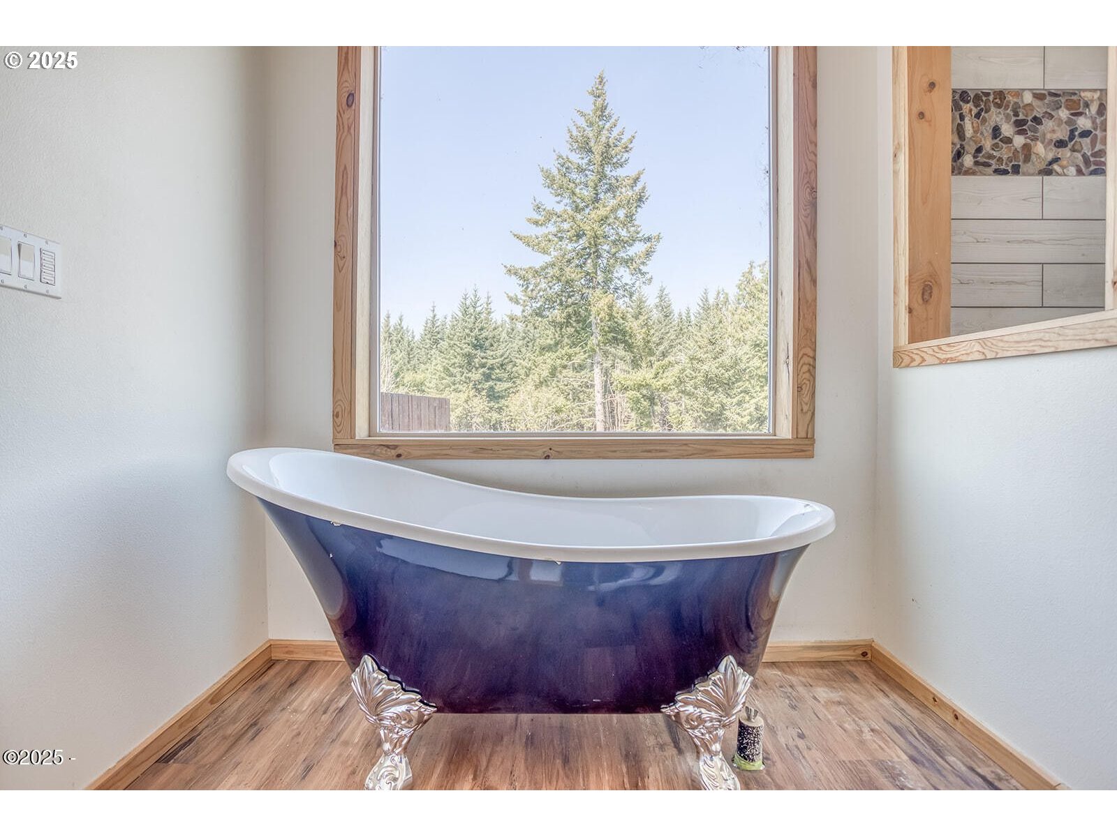 946 North Echo Mountain Road Otis, OR 97368 - Photo 21 of 48 a view of a bathtub in a room