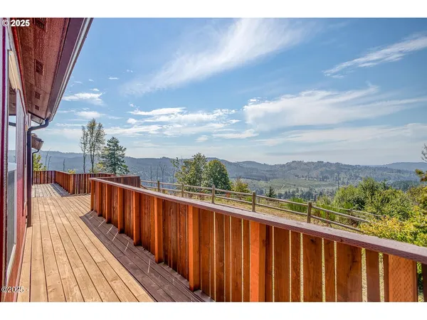 a view of balcony with furniture