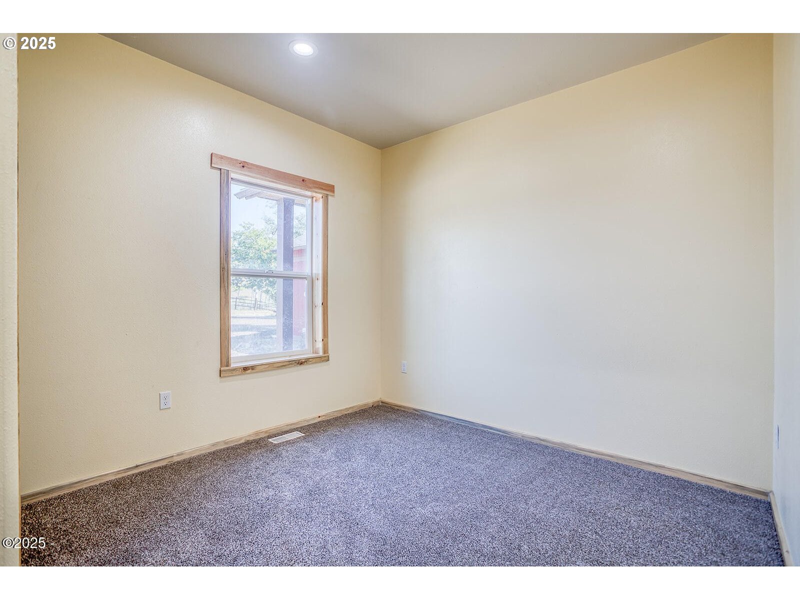 946 North Echo Mountain Road Otis, OR 97368 - Photo 33 of 48 a view of an empty room with a window