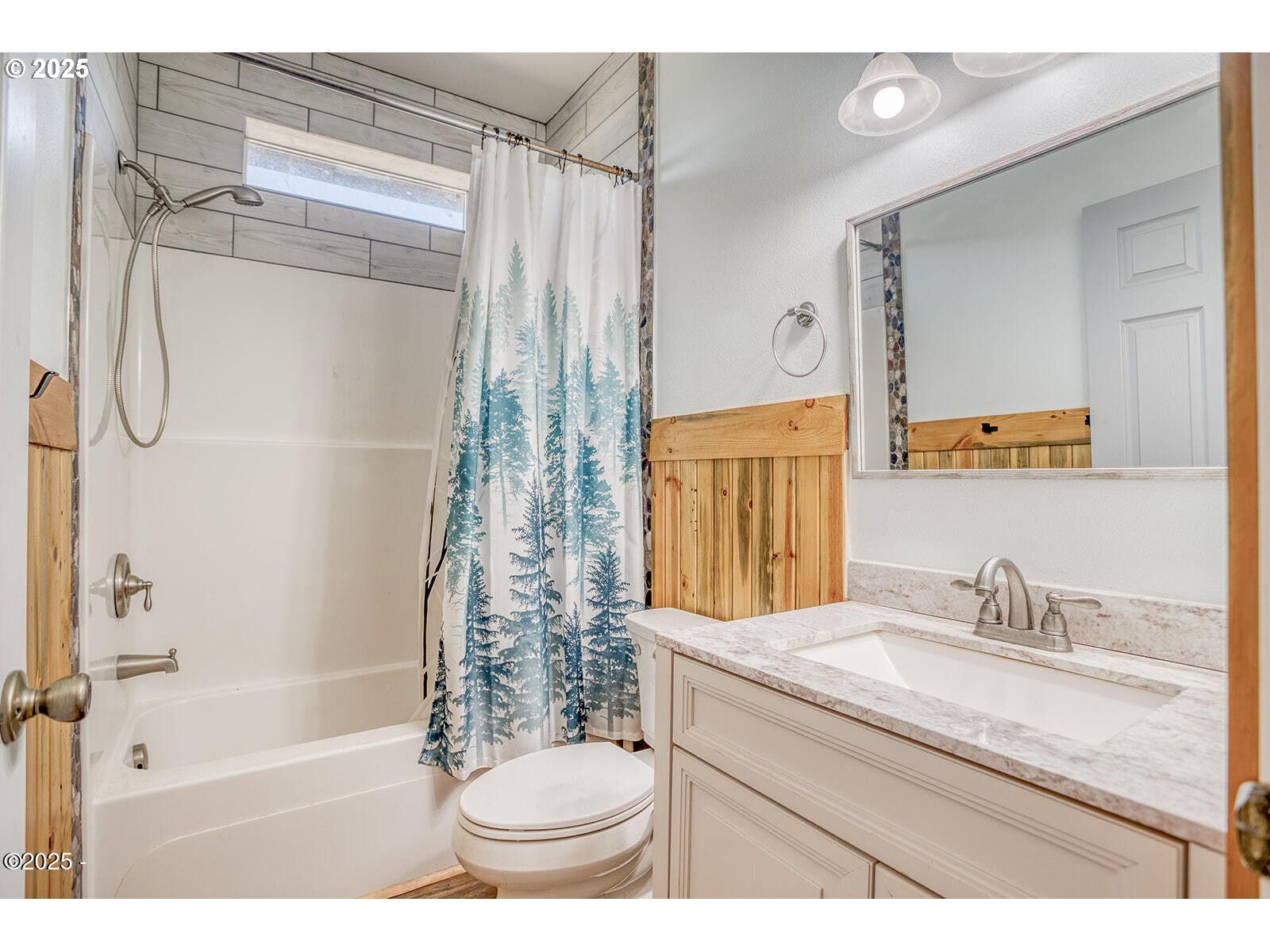 946 North Echo Mountain Road Otis, OR 97368 - Photo 37 of 48 a bathroom with a granite countertop sink toilet and shower
