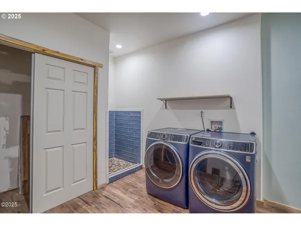 a utility room with dryer and washer
