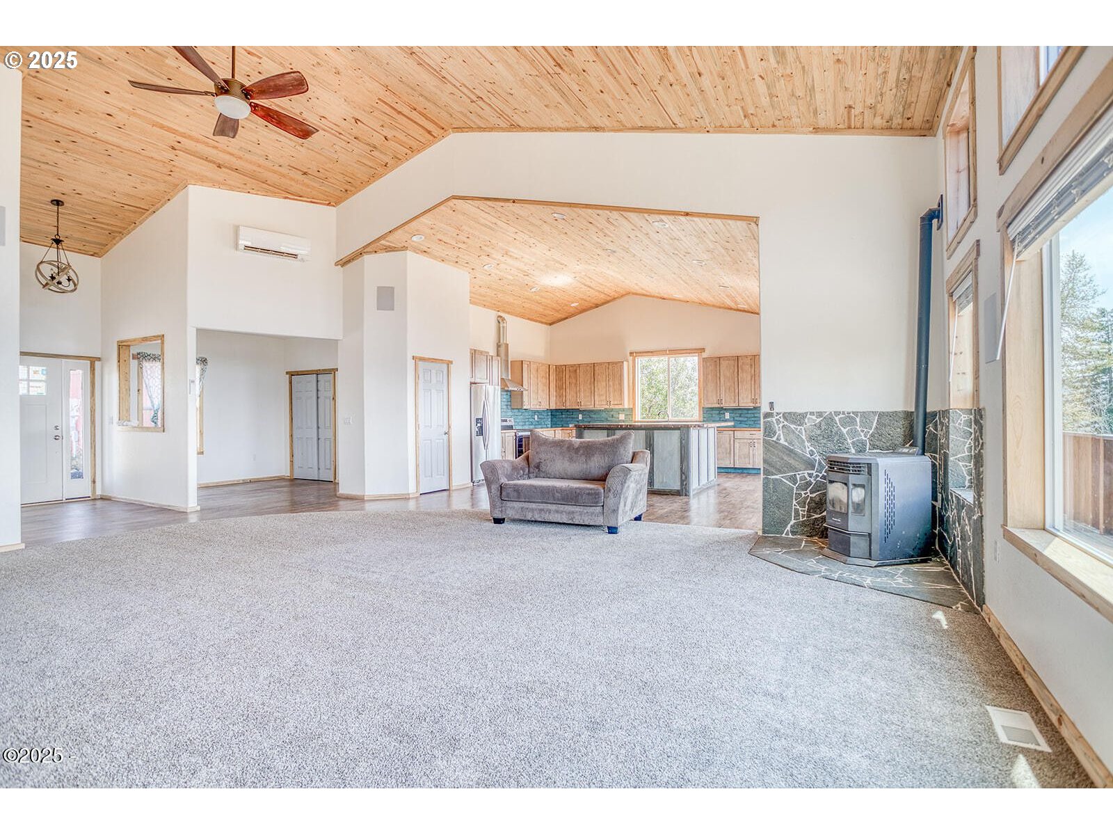 946 North Echo Mountain Road Otis, OR 97368 - Photo 7 of 48 a living room with furniture and large window