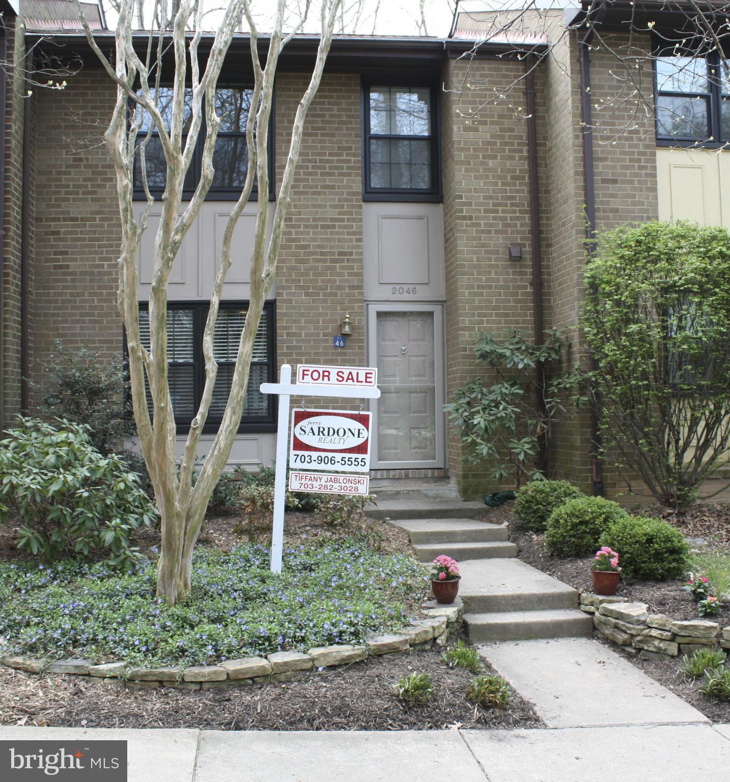2046 Headlands Circle Reston, VA 20191 - Photo 1 of 18 landscaped front yard