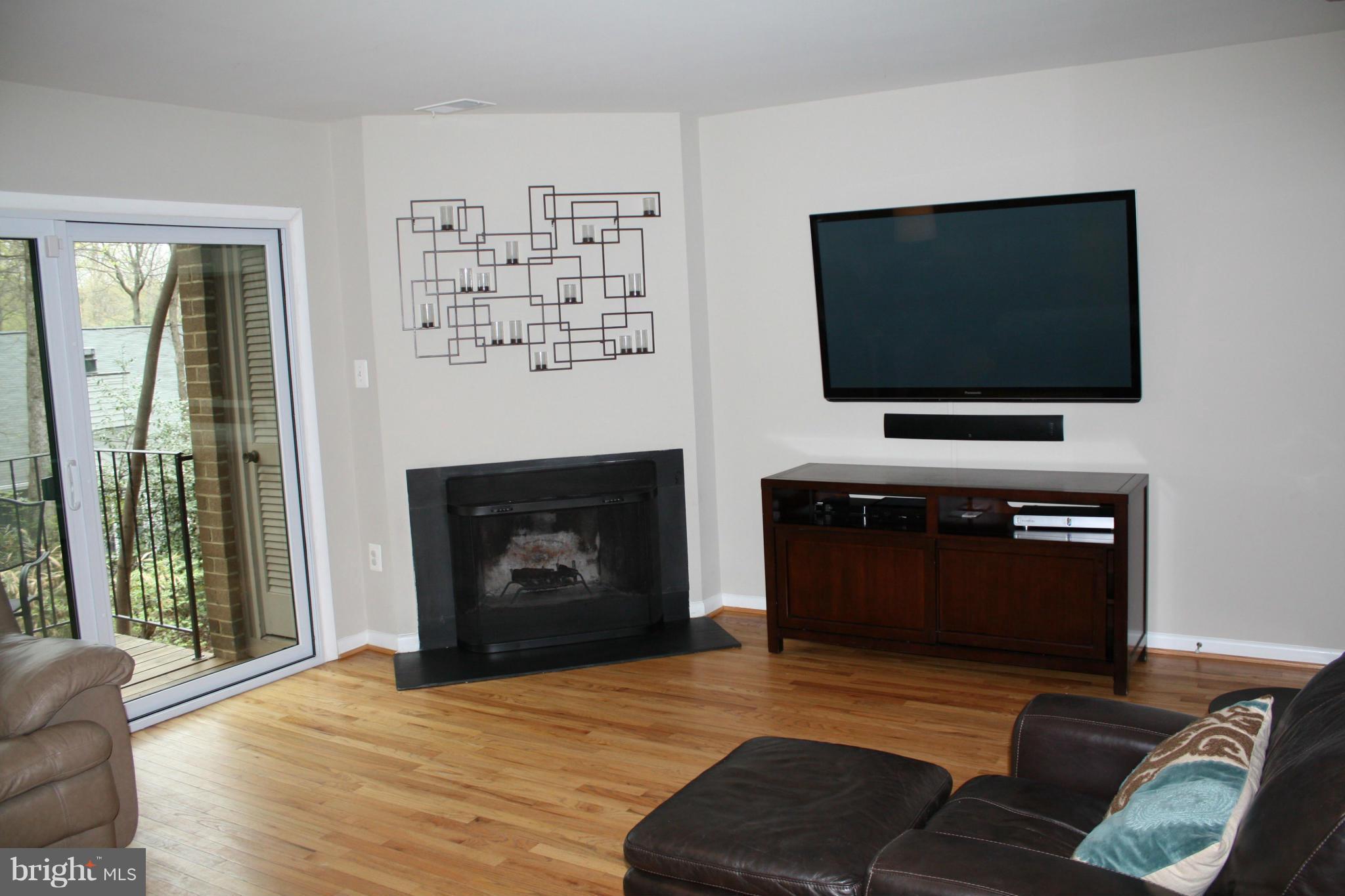 2046 Headlands Circle Reston, VA 20191 - Photo 7 of 18 Living Room with wood burning fireplace