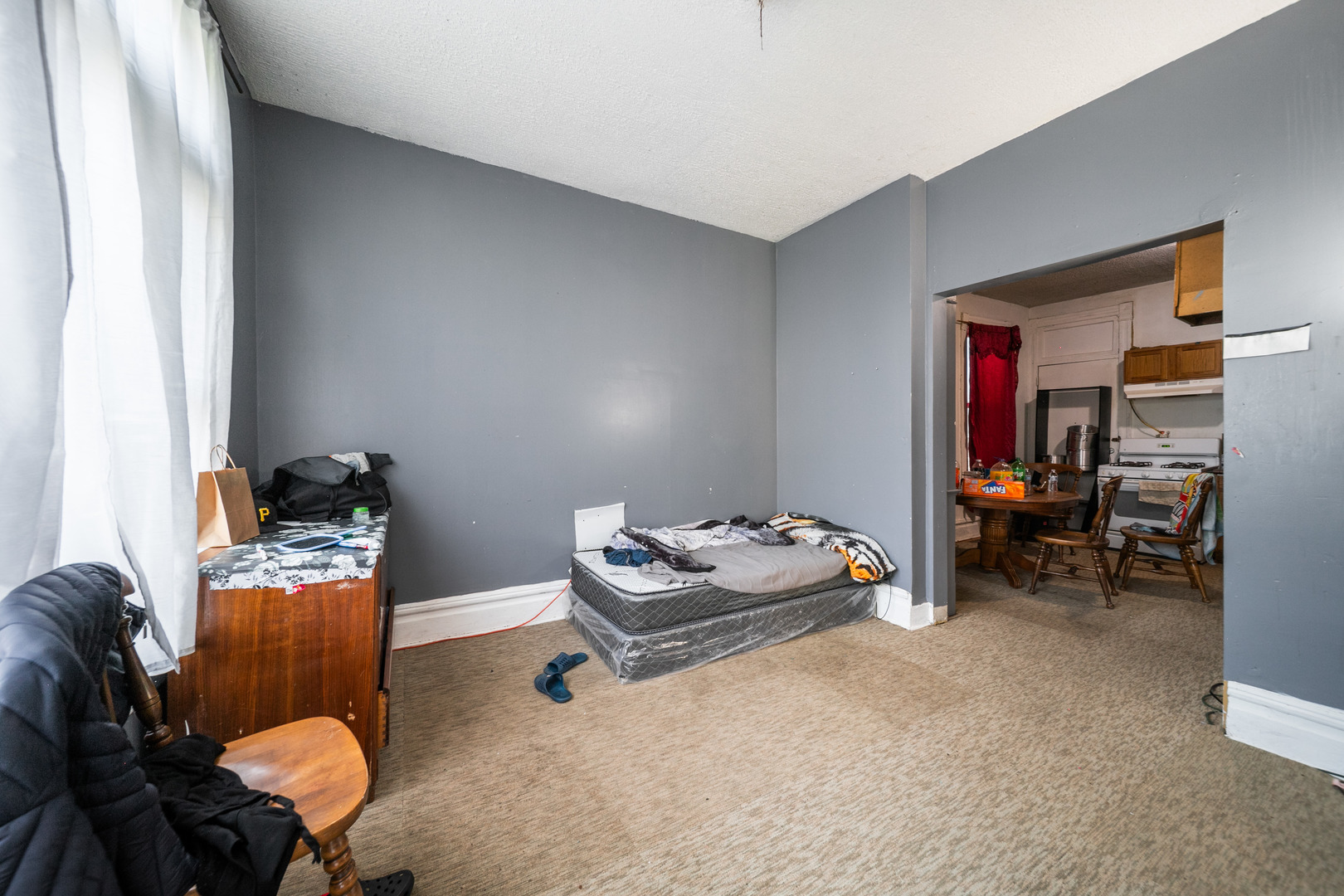 2522 South Christiana Avenue Chicago, IL 60623 - Photo 4 of 8 a room with furniture and gym equipment