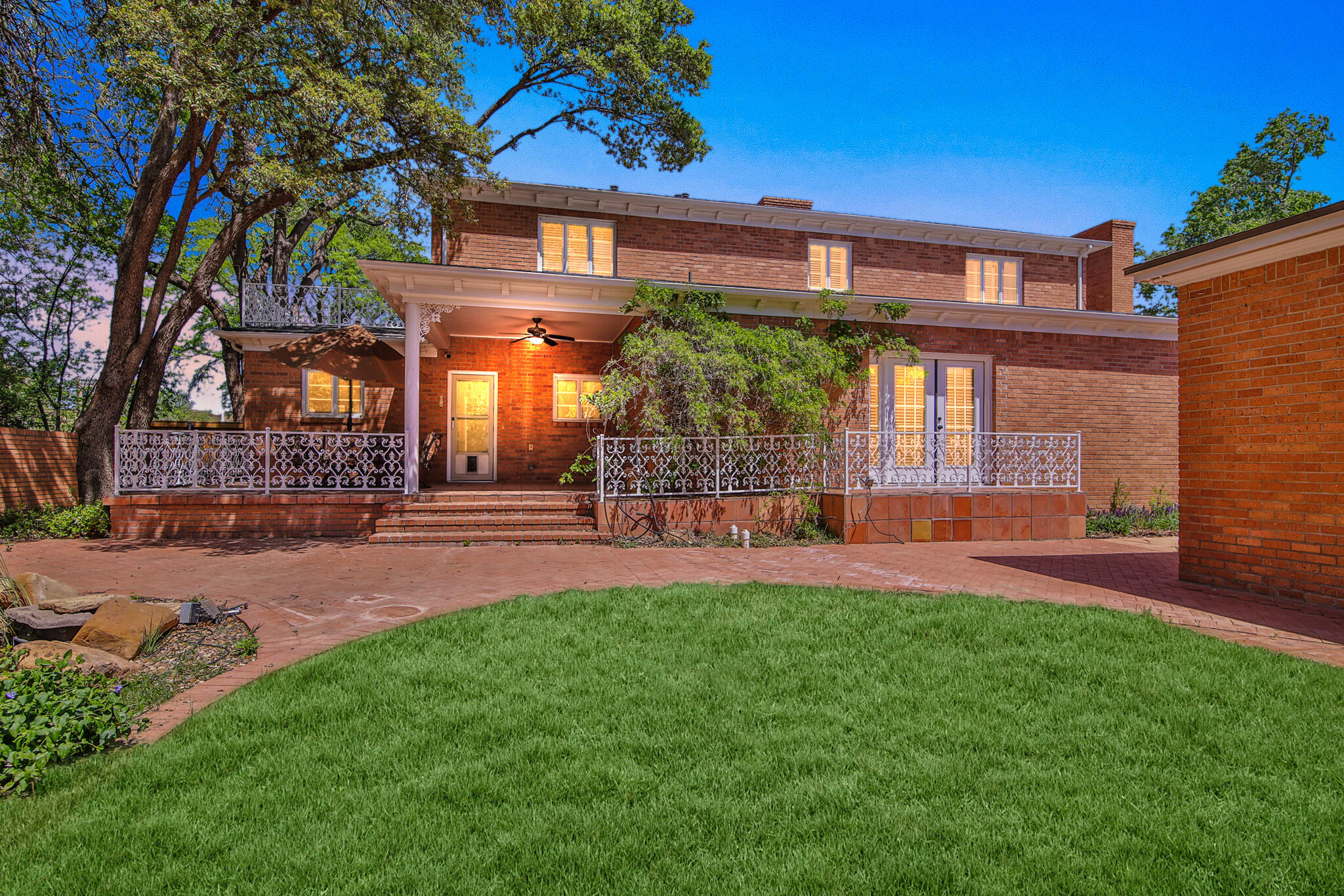 2901 19th Street Lubbock, TX 79410 - Photo 69 of 77 Twilight Backyard & Porch