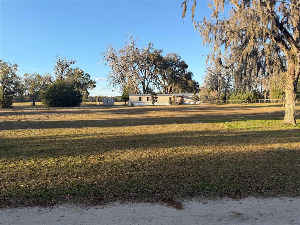 20638 Southwest 38th Avenue Newberry, FL 32669 - Photo 3 of 8 a view of an ocean and a building