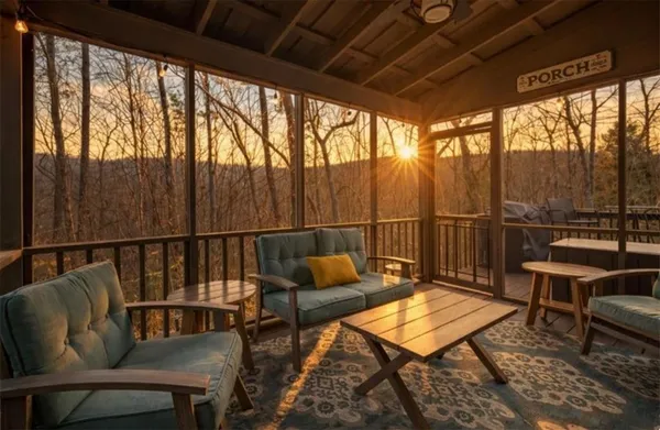 a balcony with wooden floor and outdoor seating