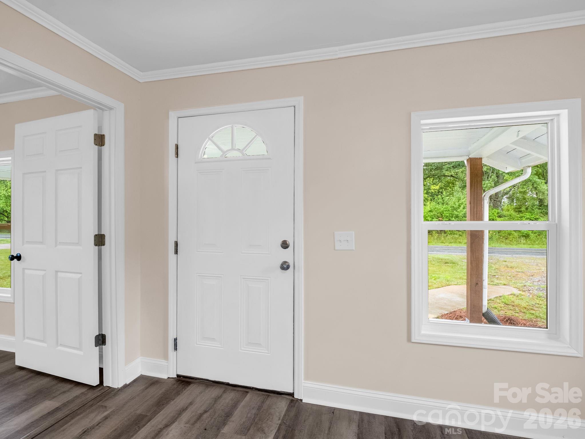 170 Dobbins Road Ellenboro, NC 28040 - Photo 13 of 32 a view of an empty room with wooden floor and window