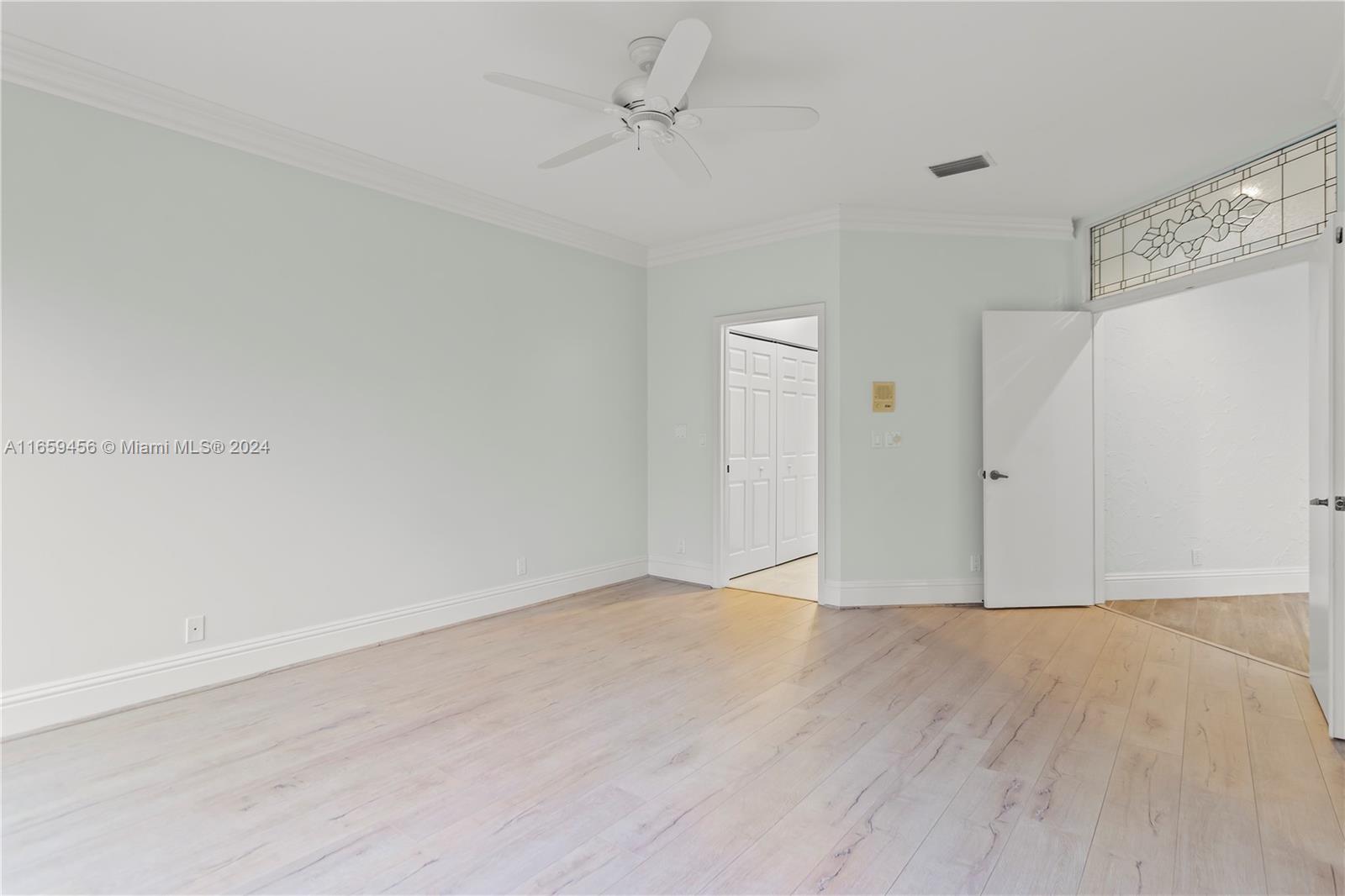 6436 Via Rosa Boca Raton, FL 33433 - Photo 18 of 38 wooden floor in an empty room