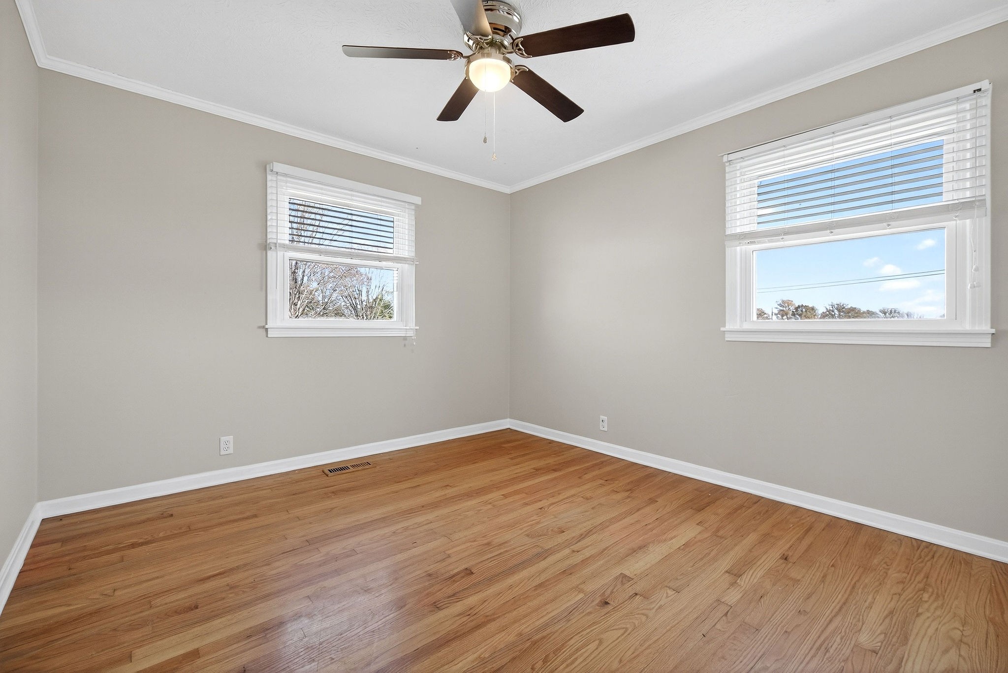 326 Webb Lane Smithville, TN 37166 - Photo 19 of 31 a view of empty room with wooden floor and fan