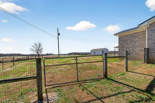 a view of a balcony with wooden floor
