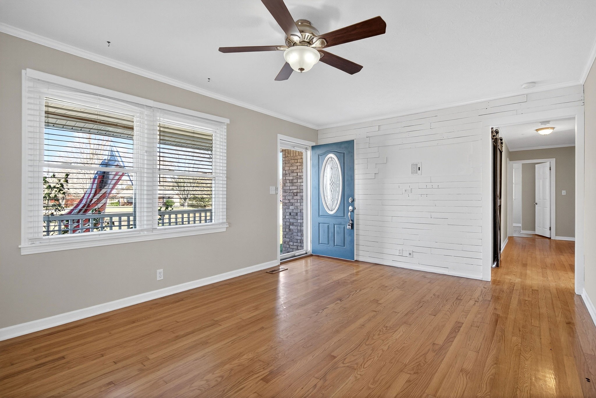 326 Webb Lane Smithville, TN 37166 - Photo 4 of 31 a view of an empty room with wooden floor and a window