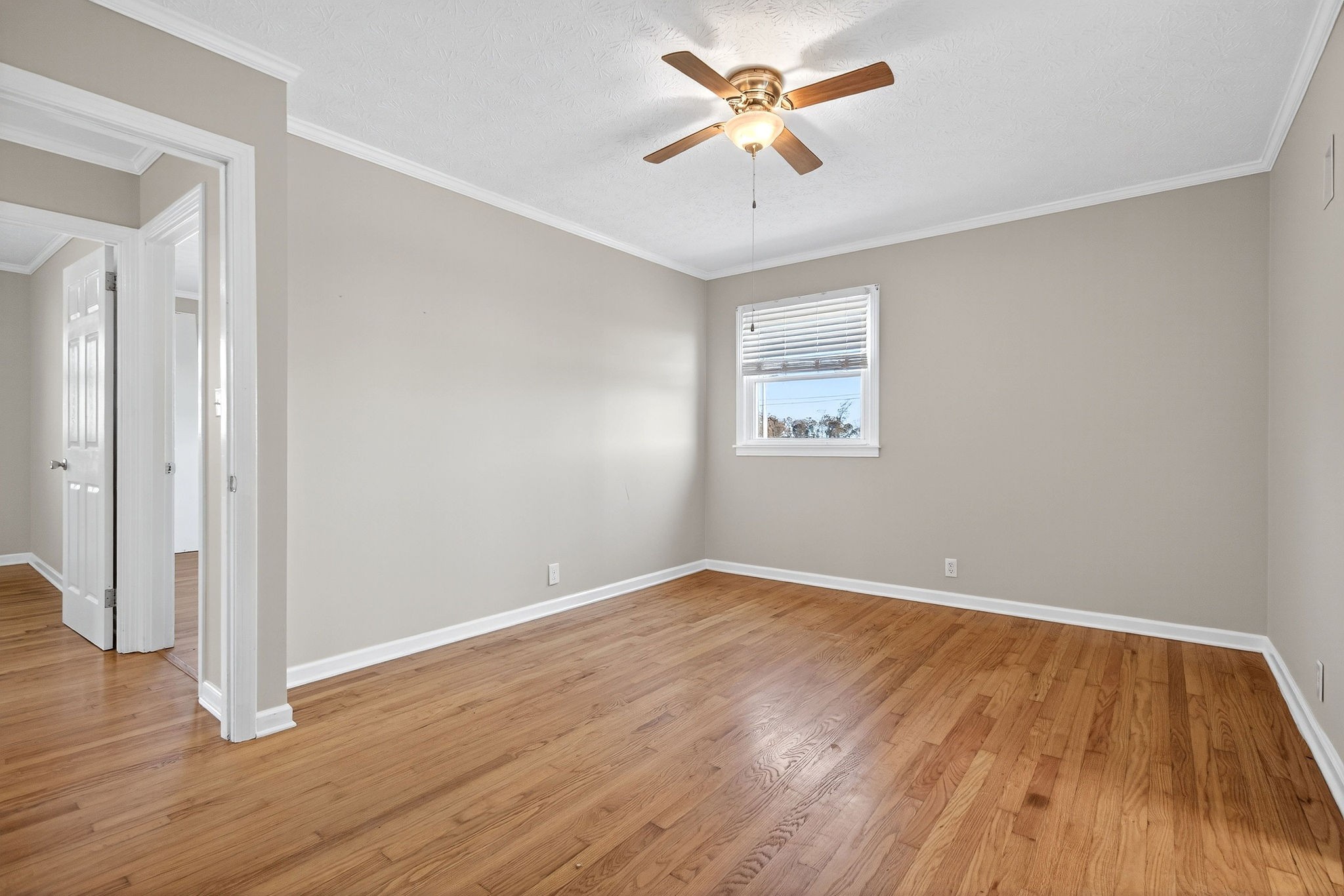 326 Webb Lane Smithville, TN 37166 - Photo 9 of 31 an empty room with wooden floor and windows