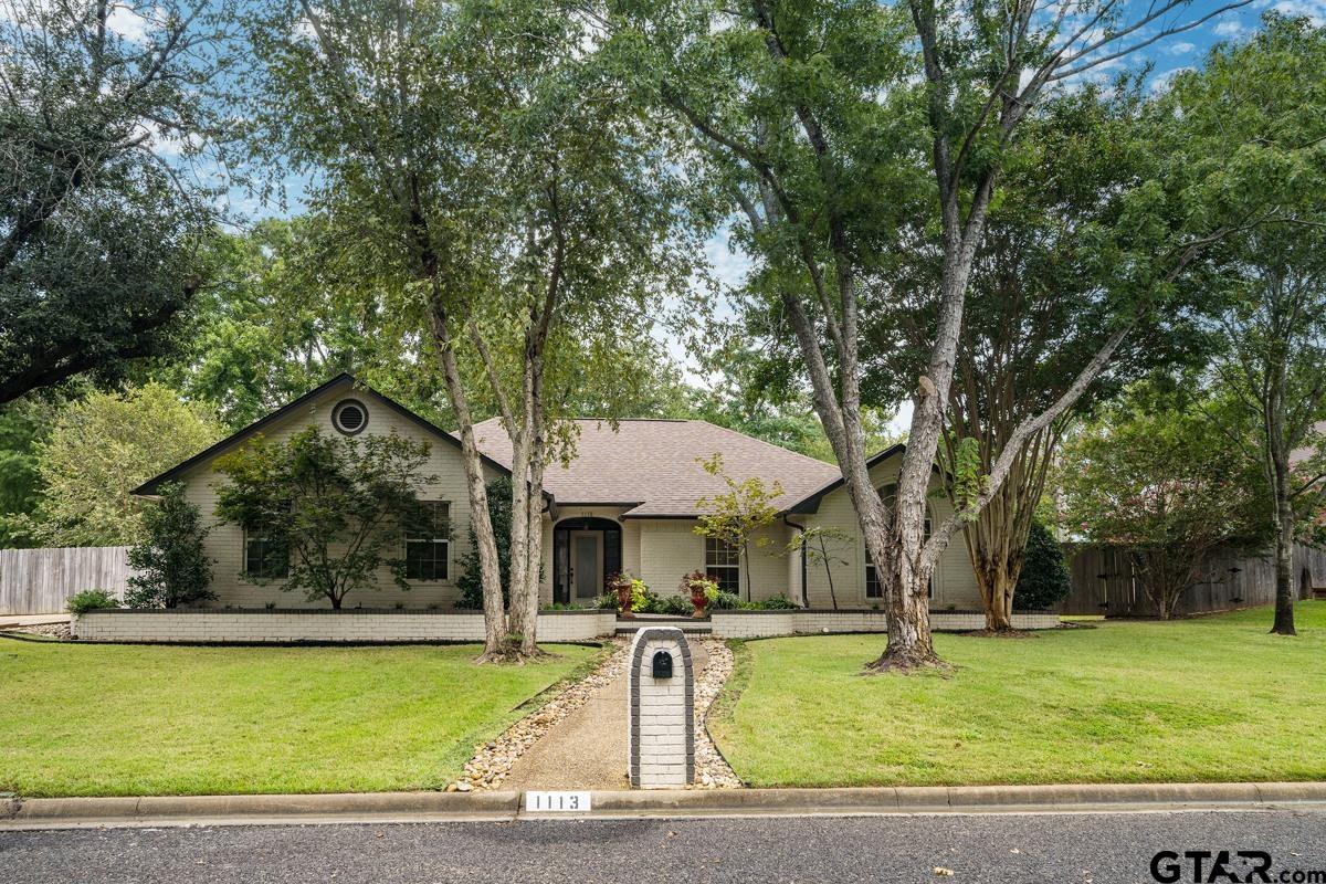 1113 Lonnie Drive Athens, TX 75751 - Photo 1 of 32 a front view of a house with a yard table and chairs