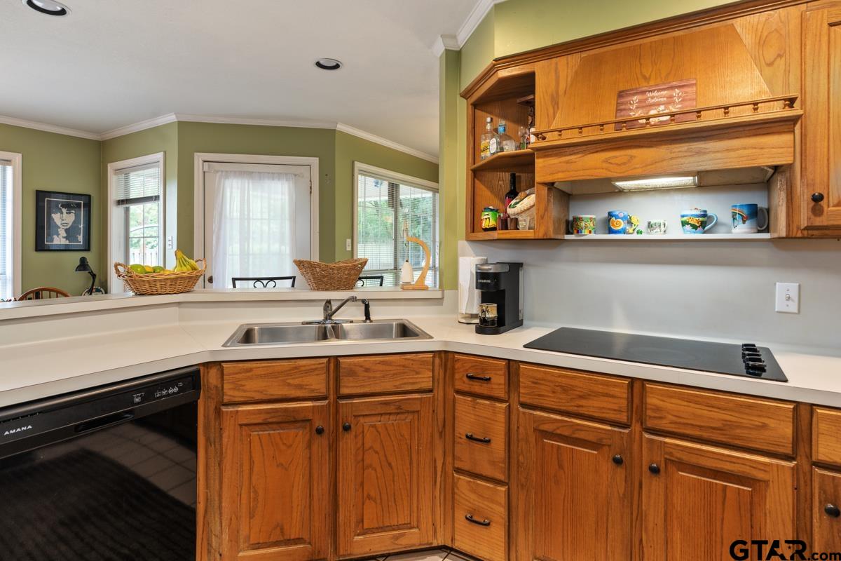 1113 Lonnie Drive Athens, TX 75751 - Photo 16 of 32 a kitchen with a sink and cabinets