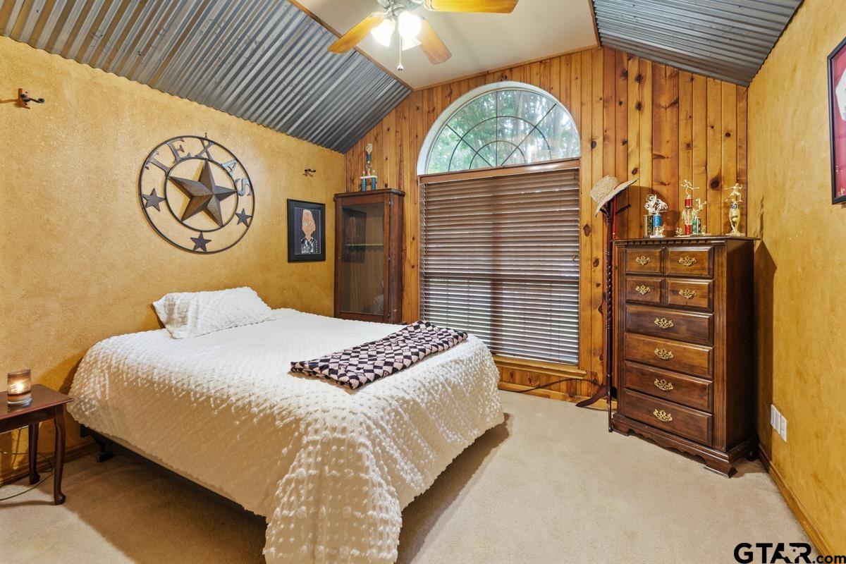 1113 Lonnie Drive Athens, TX 75751 - Photo 24 of 32 a bedroom with a bed and a window