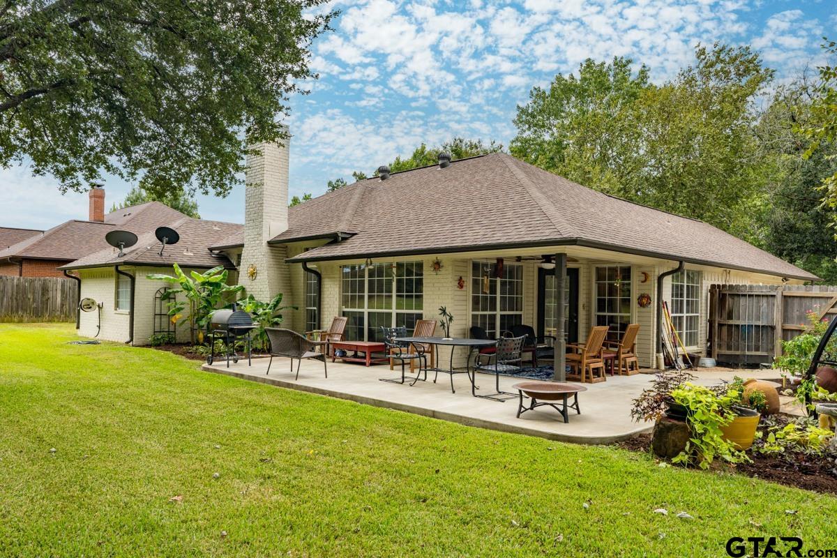 1113 Lonnie Drive Athens, TX 75751 - Photo 27 of 32 a view of a house with furniture and a garden