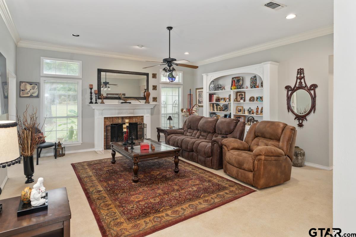 1113 Lonnie Drive Athens, TX 75751 - Photo 7 of 32 a living room with furniture and a fireplace