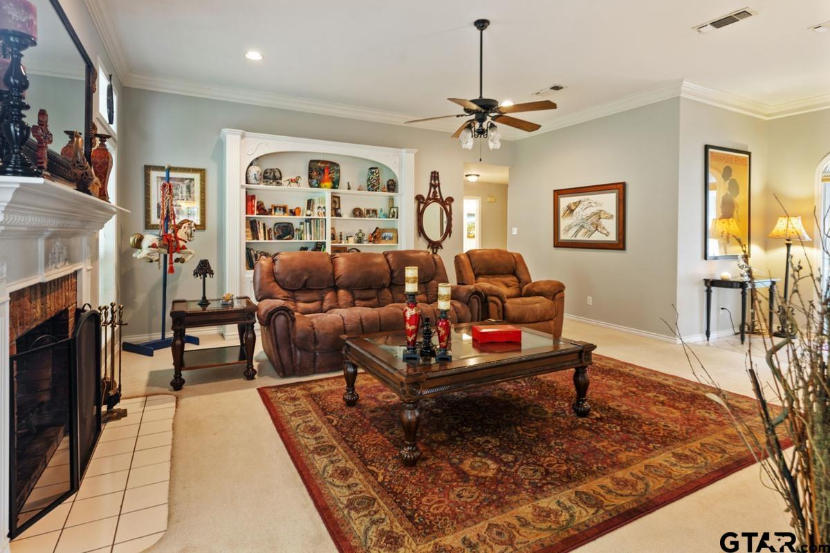 1113 Lonnie Drive Athens, TX 75751 - Photo 8 of 32 a living room with furniture and a fireplace