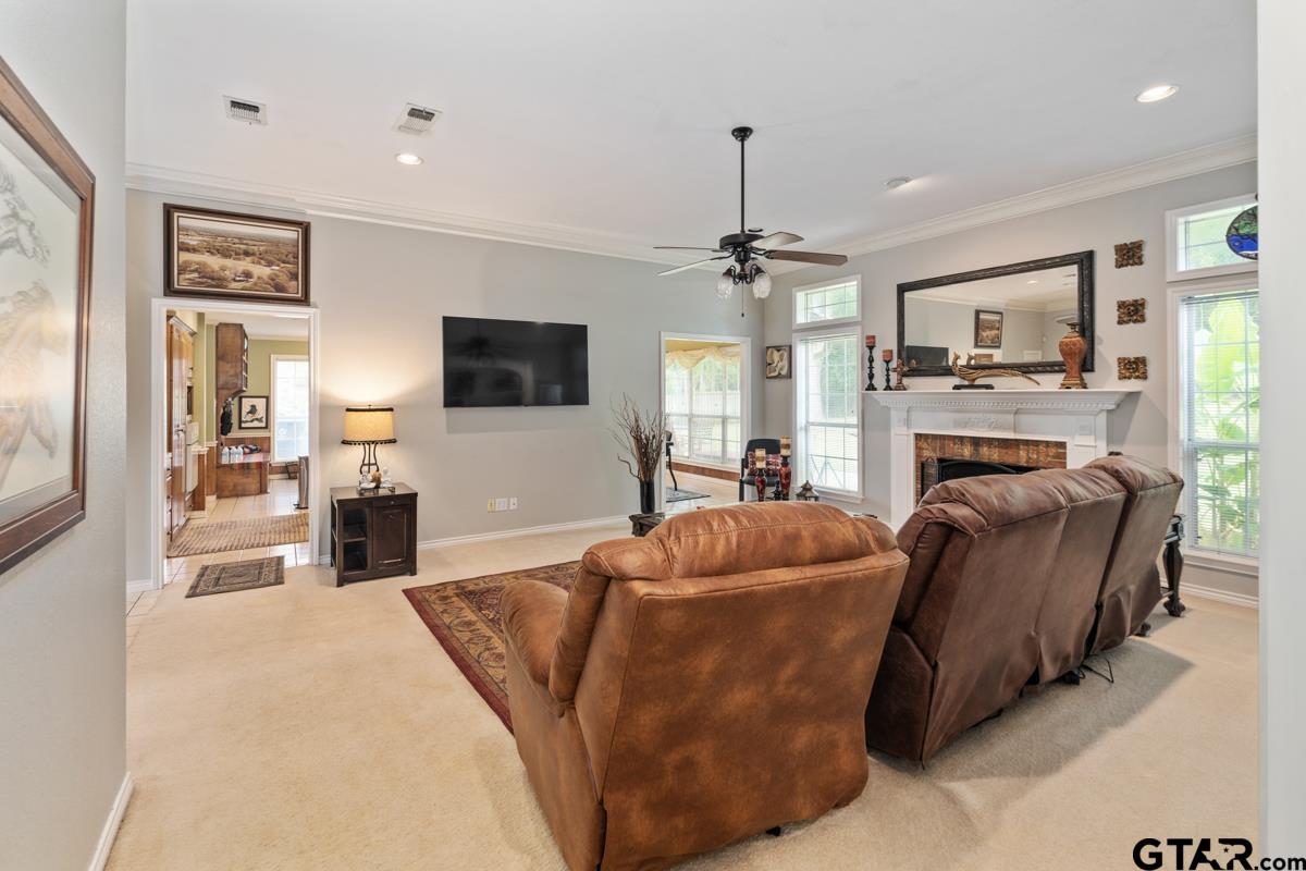 1113 Lonnie Drive Athens, TX 75751 - Photo 9 of 32 a living room with furniture and a flat screen tv