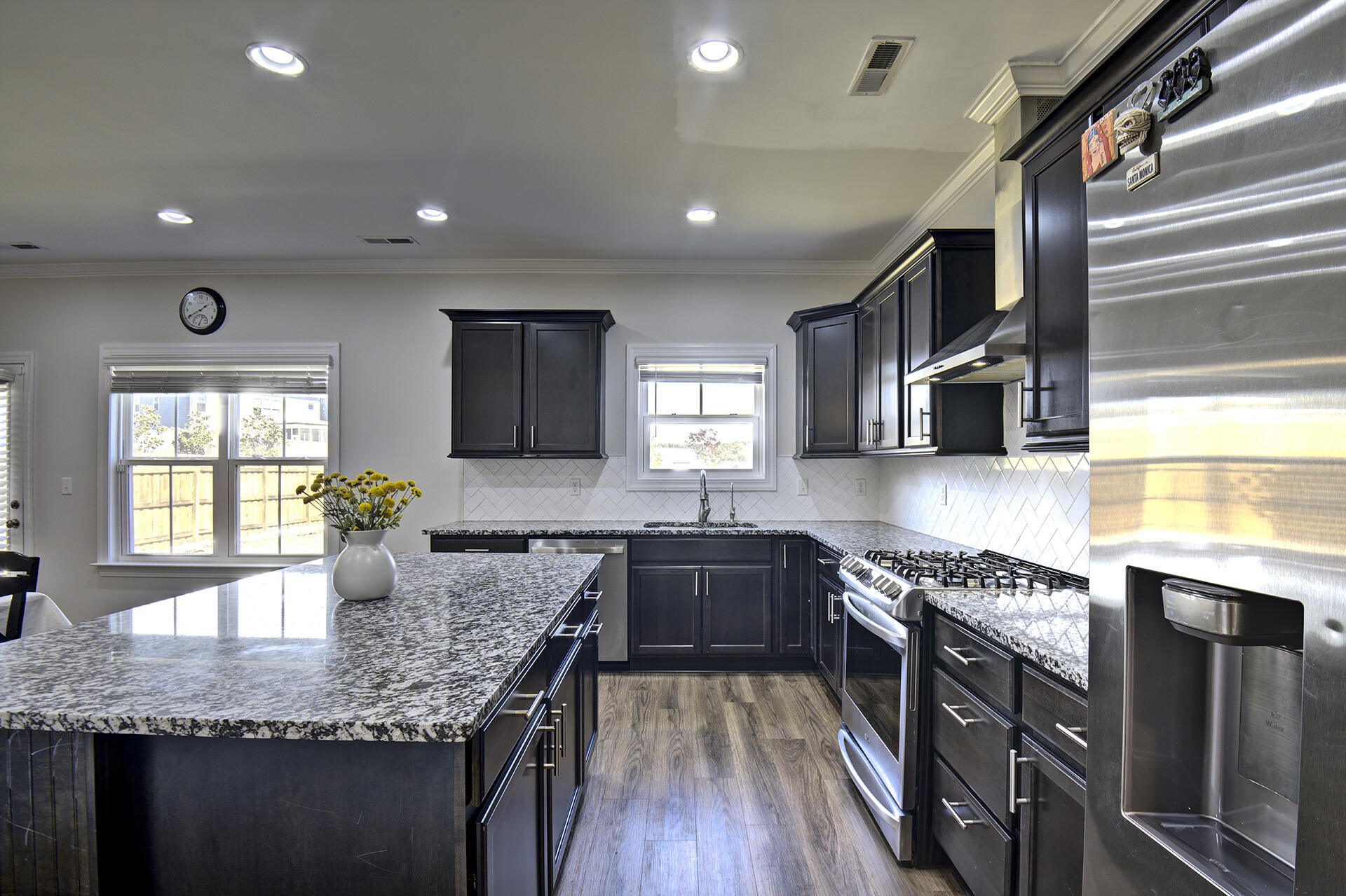 3625 Weathervane Loop Apison, TN 37302 - Photo 14 of 38 a kitchen with granite countertop kitchen island stainless steel appliances a sink stove and cabinets