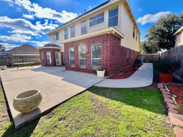 a view of a yard with a patio