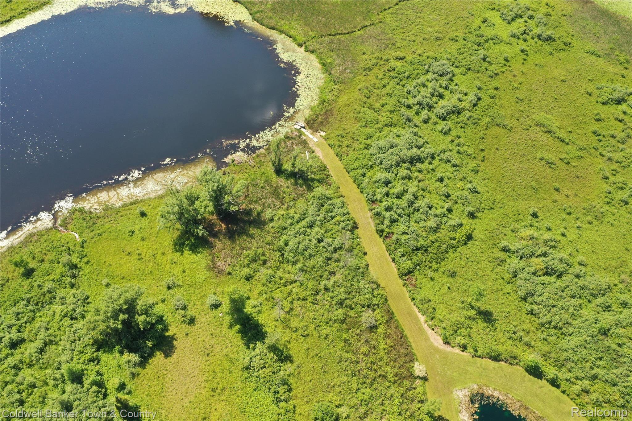 1697 North Hughes Road Howell, MI 48843 - Photo 50 of 61 LOGAN LAKE