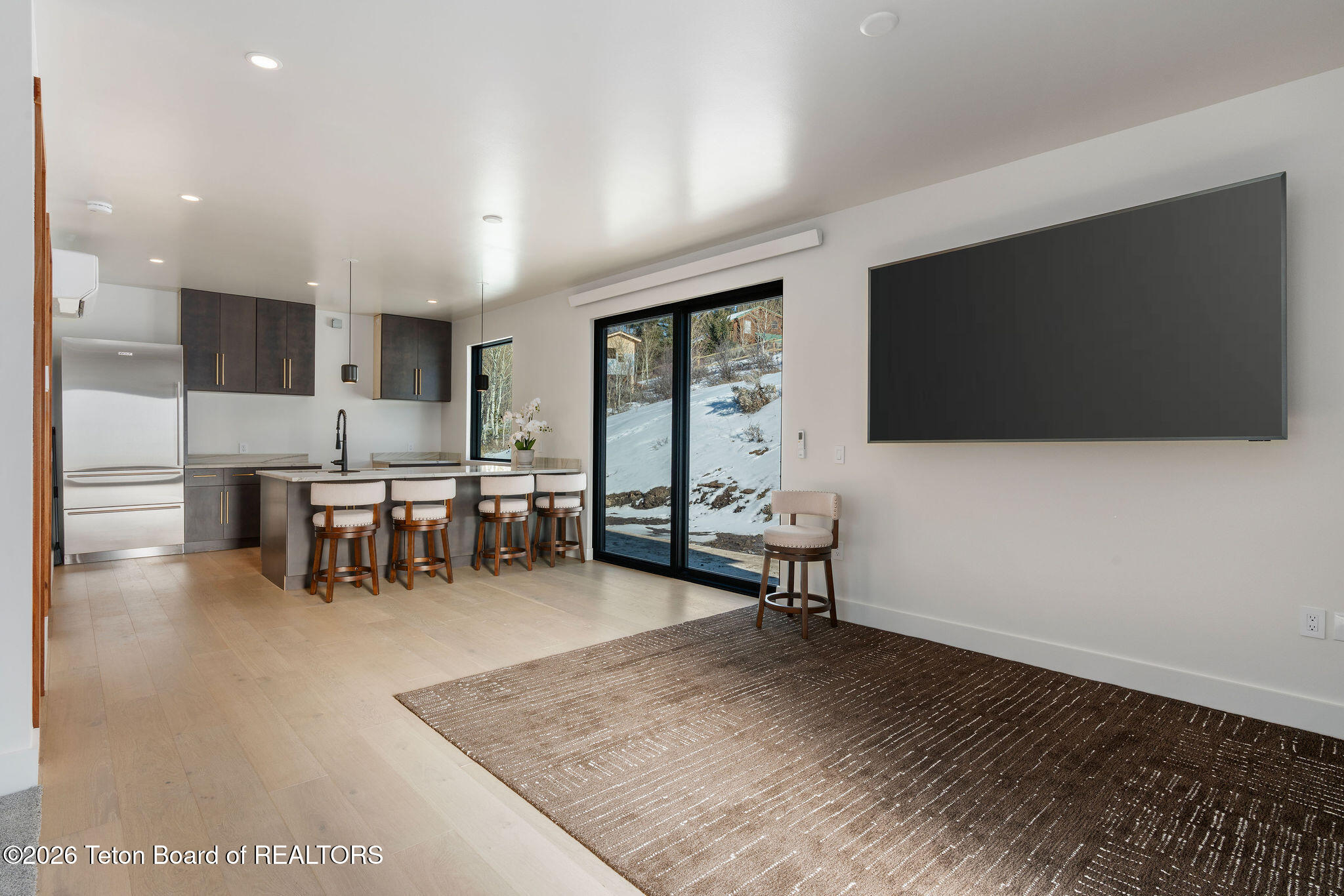 11330 Hoback Junction South Road Jackson, WY 83001 - Photo 38 of 57 Guest house living and kitchen