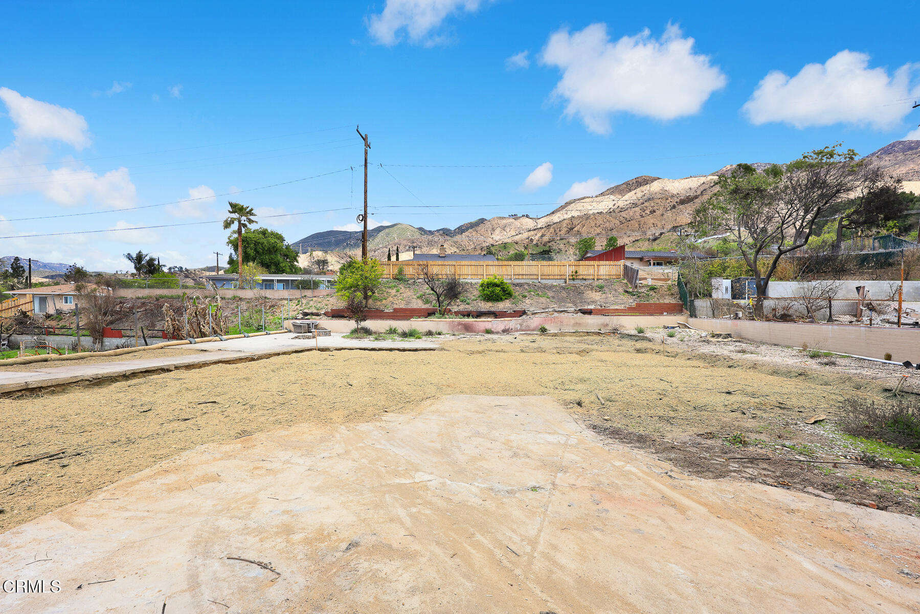 411 Alta Pine Drive Altadena, CA 91001 - Photo 6 of 23 a view of houses with a yard and lake view