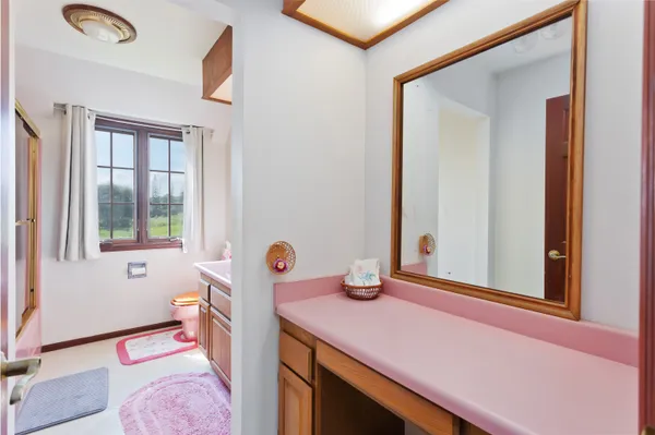 a view of a room with a window