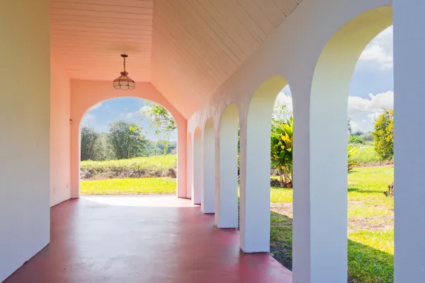 a view of an entryway with a swimming pool