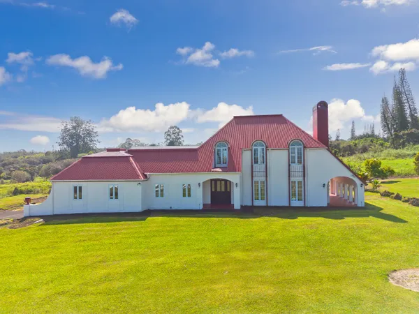 a view of a house with a swimming pool
