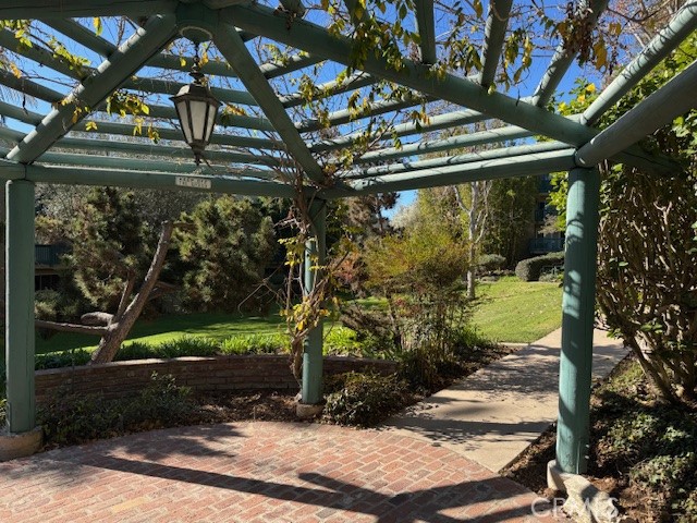 564 North Bellflower Boulevard, Unit 203 Long Beach, CA 90814 - Photo 11 of 20 a view of a yard with plants