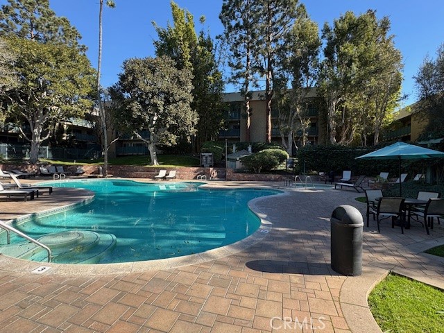 564 North Bellflower Boulevard, Unit 203 Long Beach, CA 90814 - Photo 8 of 20 a view of a park with plants