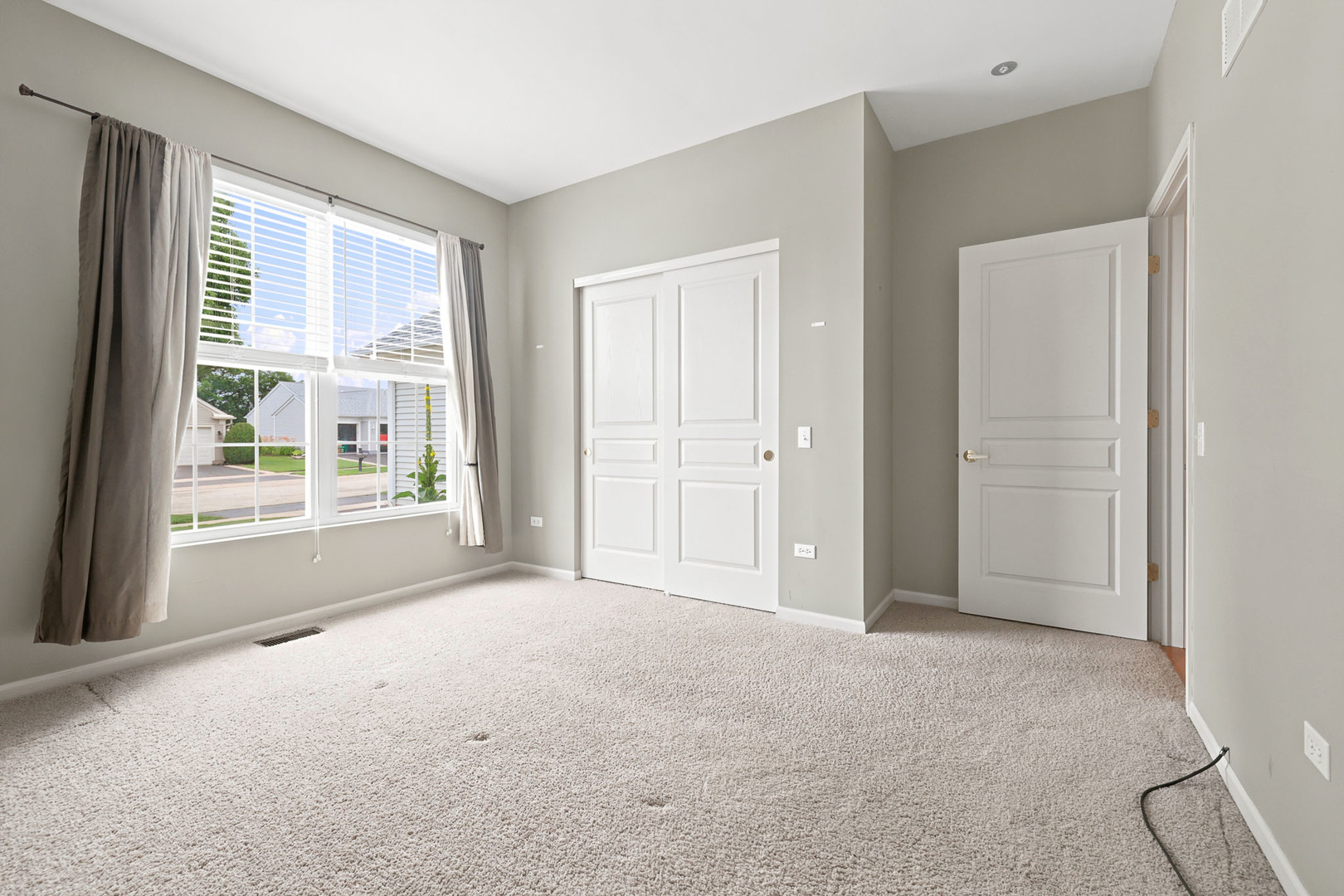 11923 Harrison Road Huntley, IL 60142 - Photo 23 of 38 a view of an empty room with a window