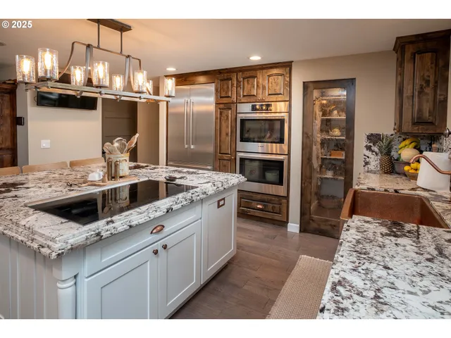an aerial view of residential houses and outdoor space