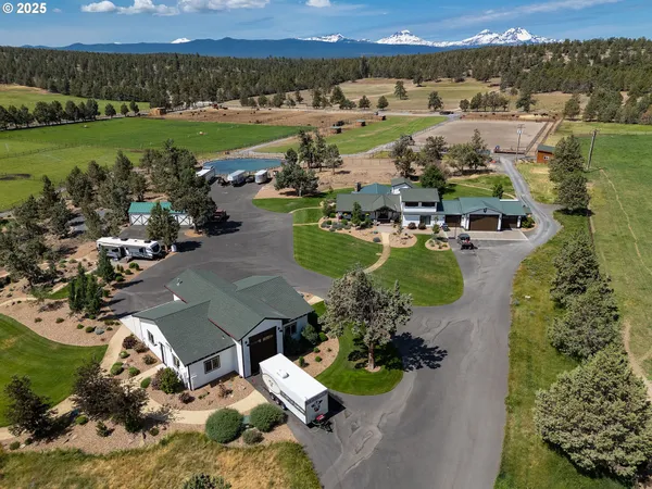 an aerial view of a house with a garden