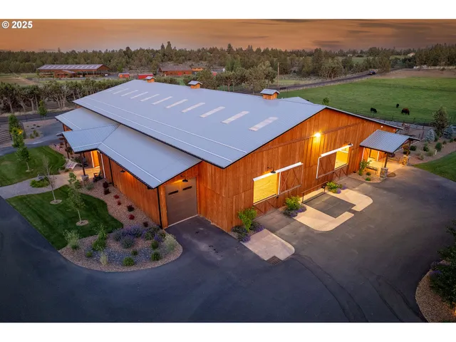 a aerial view of a house with a big yard