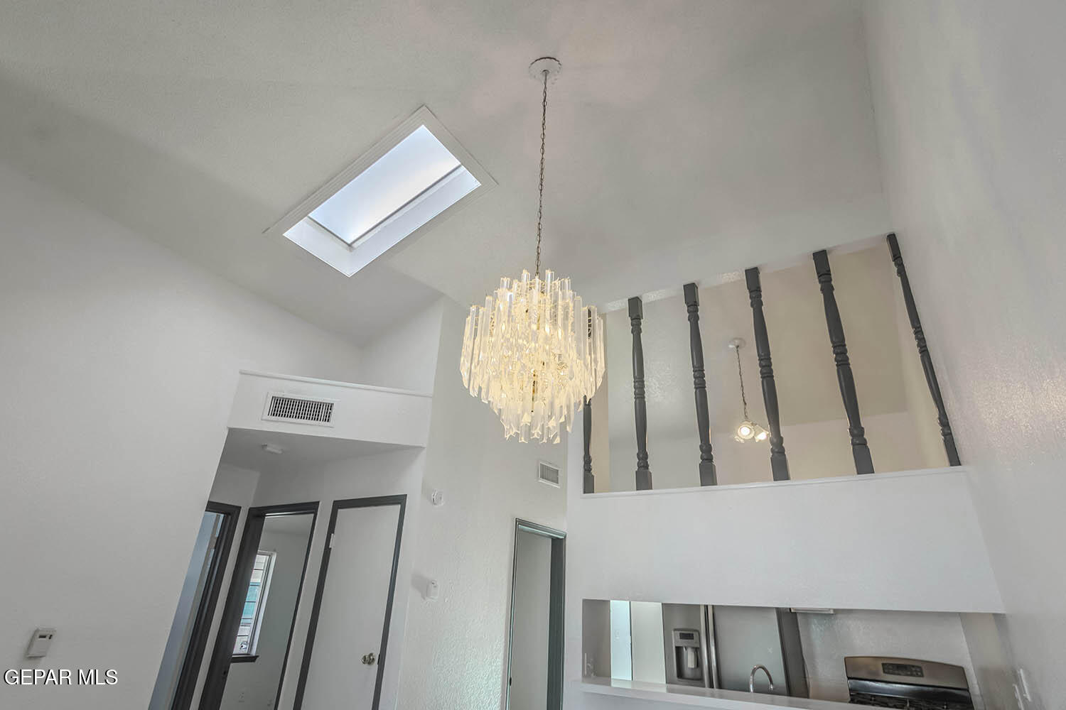 859 Destello Road El Paso, TX 79907 - Photo 14 of 43 a view of a hallway with windows
